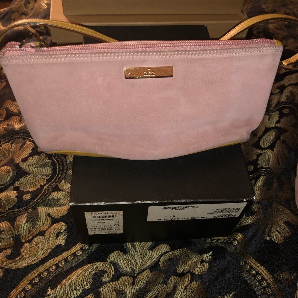 Sleek Gucci Clutch Suede with leather strap